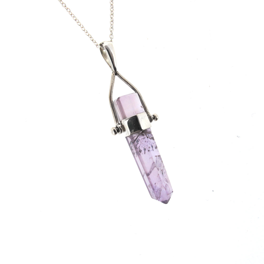 Amethyst crystal point pendant, sterling silver casing and sterling silver chain.
