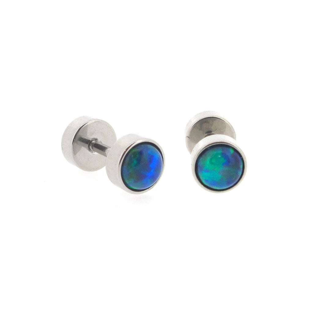 Opal- blue, stainles steel flesh tunnel earrings. 1.2mm stem