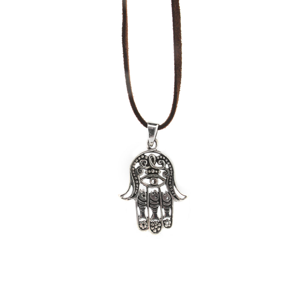 Hand of fatama sterling silver pendant, on brown faux suede