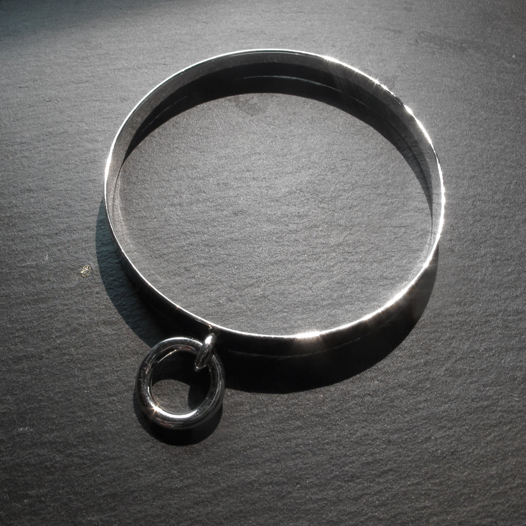 Fetish sterling silver bangle