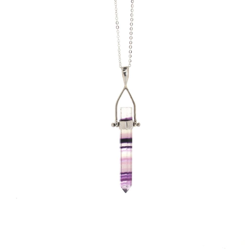 Fluorite crystal point pendant, sterling silver casing and sterling silver chain.