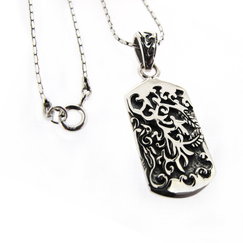 Absract Japanese woodland carving dog tag on sterling silver chain