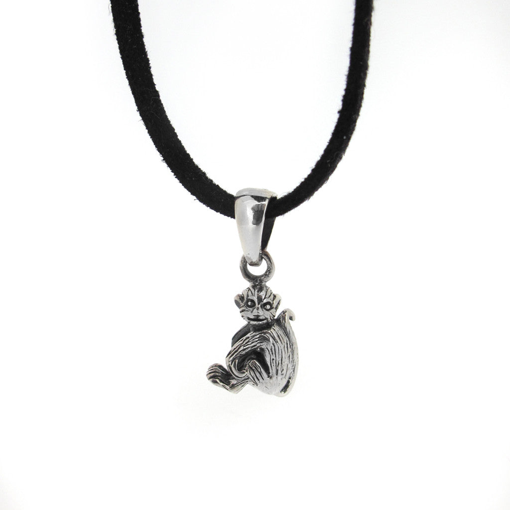 Monkey sterling silver pendent on felt necklace