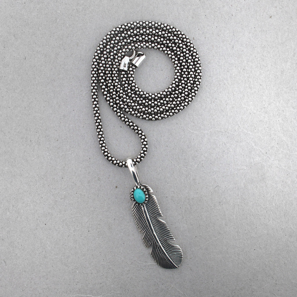 Feather and stone sterling Silver pendant on sterling silver chain