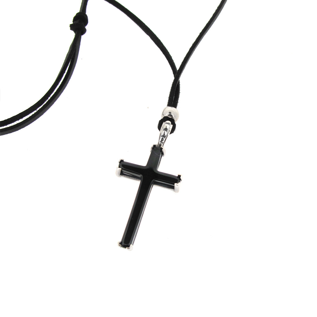 Onyx gemstone cross pendant with sterling silver surround, on black faux suede