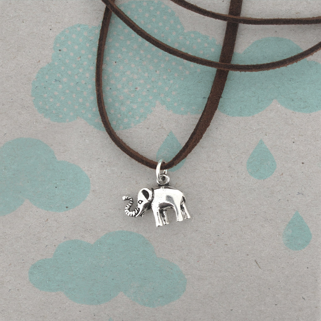 Elephant sterling silver pendant on brown faux suede cord