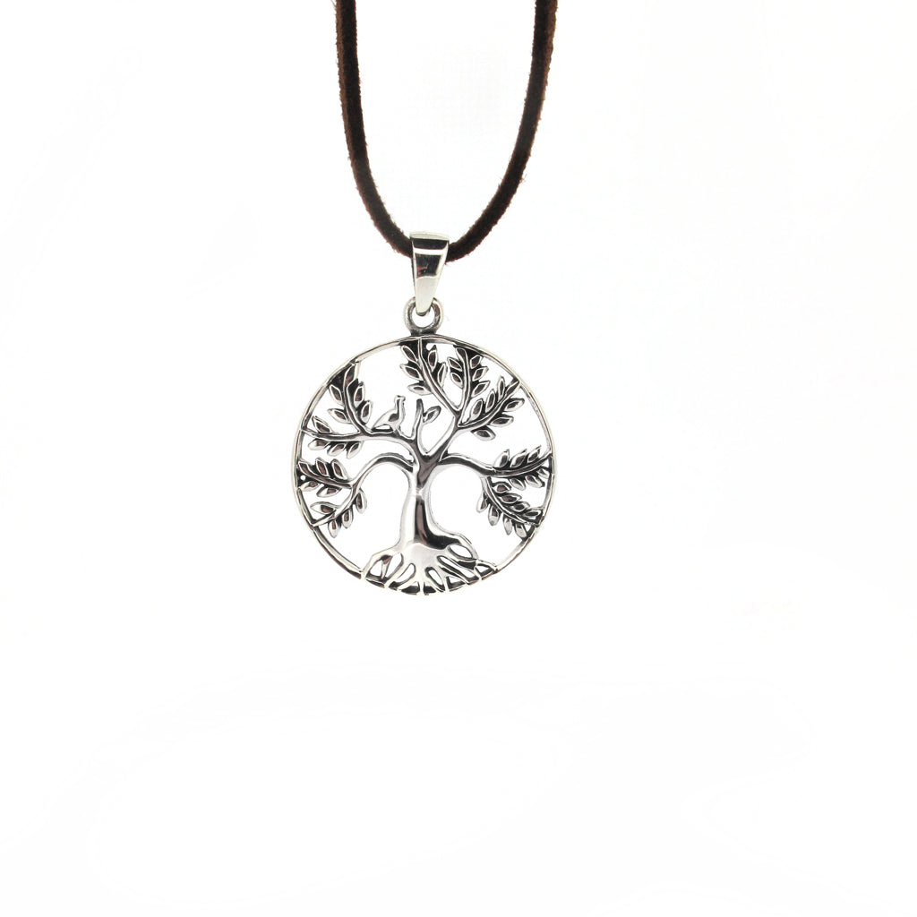 Tree of life sterling silver pendant, on brown faux suede